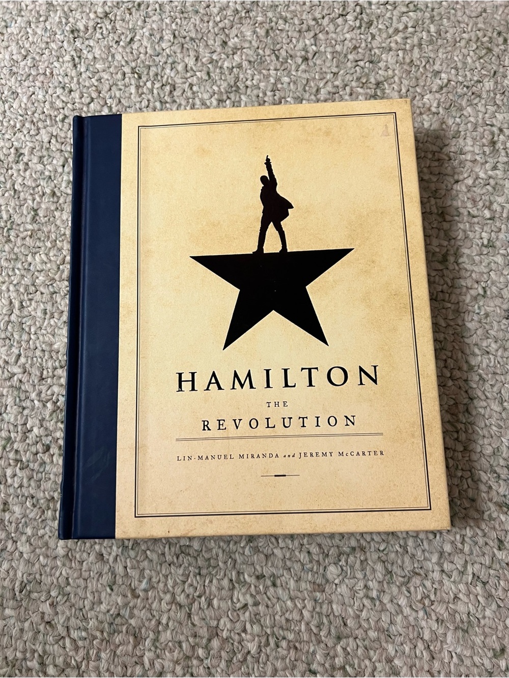 Hamilton: The Revolution Hardcover Book - Beige and Black